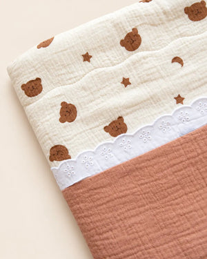 Decorative baby blanket with assorted prints and scalloped trim