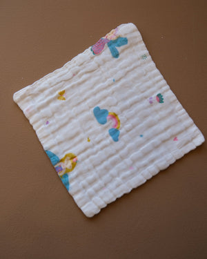 Six-layer white muslin baby face towel with assorted colorful printed designs