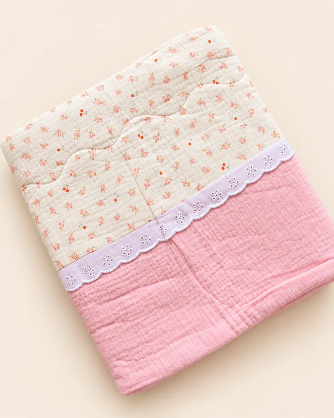 Decorative baby blanket with assorted prints and scalloped trim