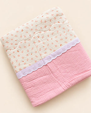 Decorative baby blanket with assorted prints and scalloped trim
