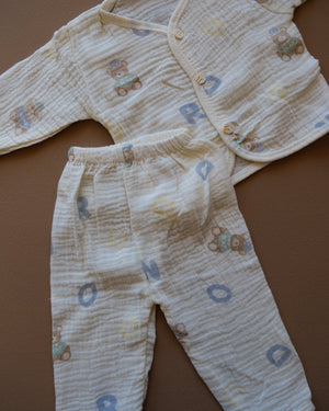Pale blue baby clothing set with bear and letter prints