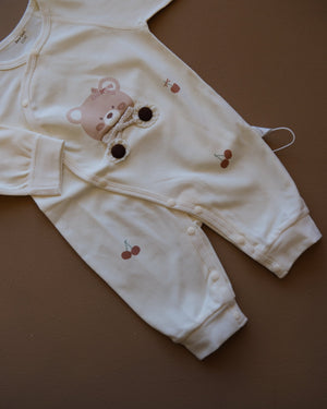 Long-sleeve baby cotton sleepsuit with bear and cherry prints
