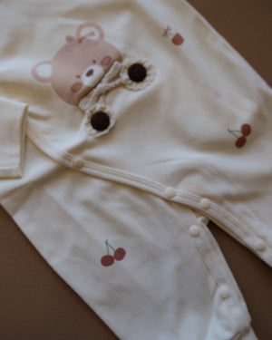 Long-sleeve baby cotton sleepsuit with bear and cherry prints